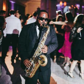 Saxophone solo with Night Shift Ent. band at corporate event